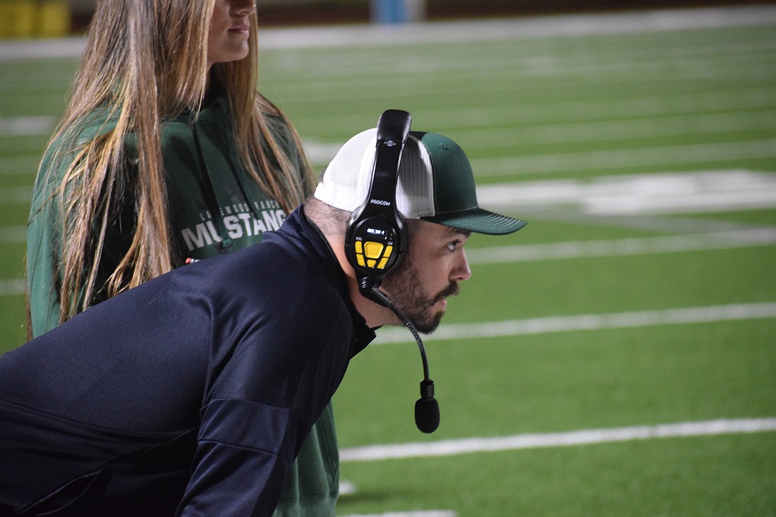 Lakewood Ranch High football coach Scott Paravicini looks on during an Oct. 30 game against Bayshore. Per the FHSAA's tentative classifications, the Mustangs are bound for Class 6A-District 12 after finishing the 2025 season at 4-6 in 6A-11.