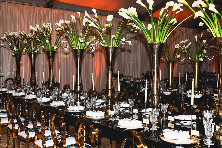 Decorated tables at Sarasota Art Museum's annual Art Bash with a theme titled 'Style Moderne'.