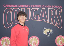 Bo O'Daniel poses for a photo on Dec. 15 at Cardinal Mooney Catholic High School. The senior had three touchdown catches for the Cougars in the Dec. 10 FHSAA Class 2A state championship.