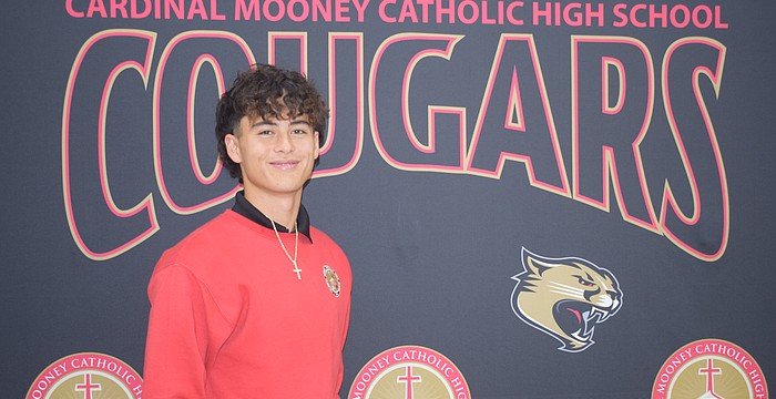 Bo O'Daniel poses for a photo on Dec. 15 at Cardinal Mooney Catholic High School. The senior had three touchdown catches for the Cougars in the Dec. 10 FHSAA Class 2A state championship.