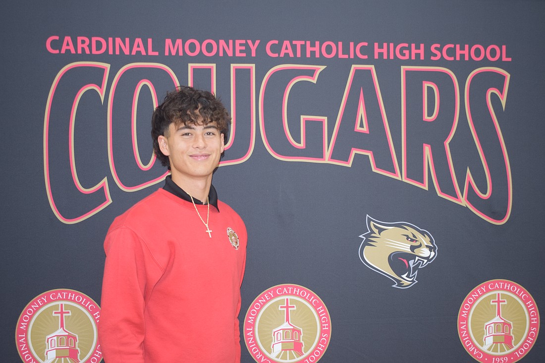 Bo O'Daniel poses for a photo on Dec. 15 at Cardinal Mooney Catholic High School. The senior had three touchdown catches for the Cougars in the Dec. 10 FHSAA Class 2A state championship.
