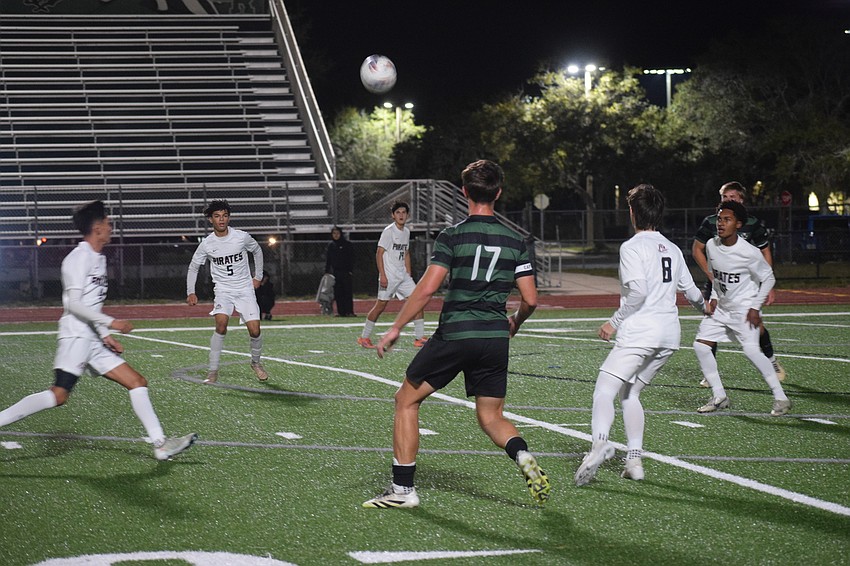 Broden Beorlegui (17) stands alone in a crowd of Pirates as he approaches the ball, looking to move up the field. Broden Beorlegui (17) stands alone in a crowd of Pirates as he approaches the ball, looking to move up the field.