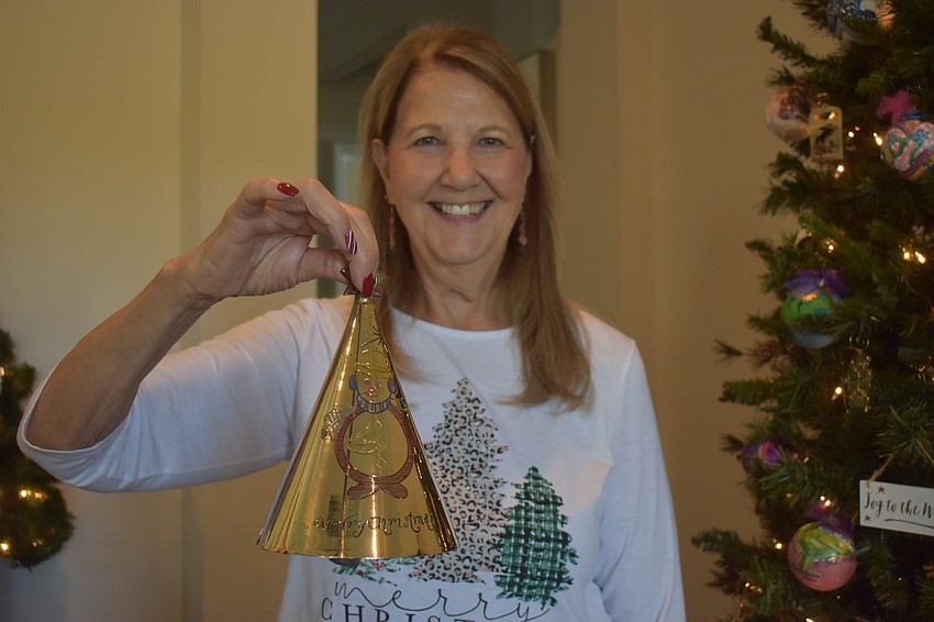 Country Club East's Barbara Thornton continues to ring a gold bell every year that reminds her of memories when her children still lived in the house.