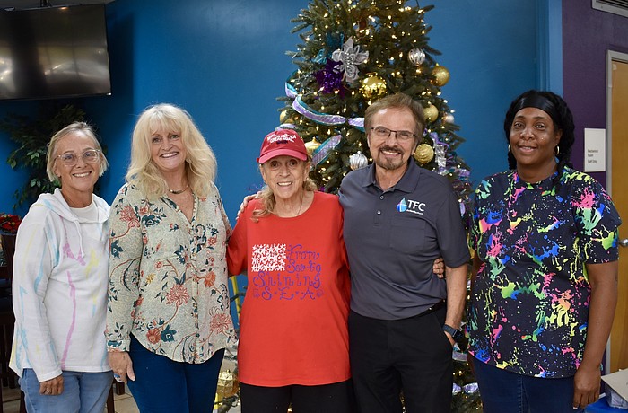 The Family Church caroling crew from left to right is Melody Johnson, Laurie Houston, Nancy Pilato, Pastor Phil Derstine and Terrial Robinson.