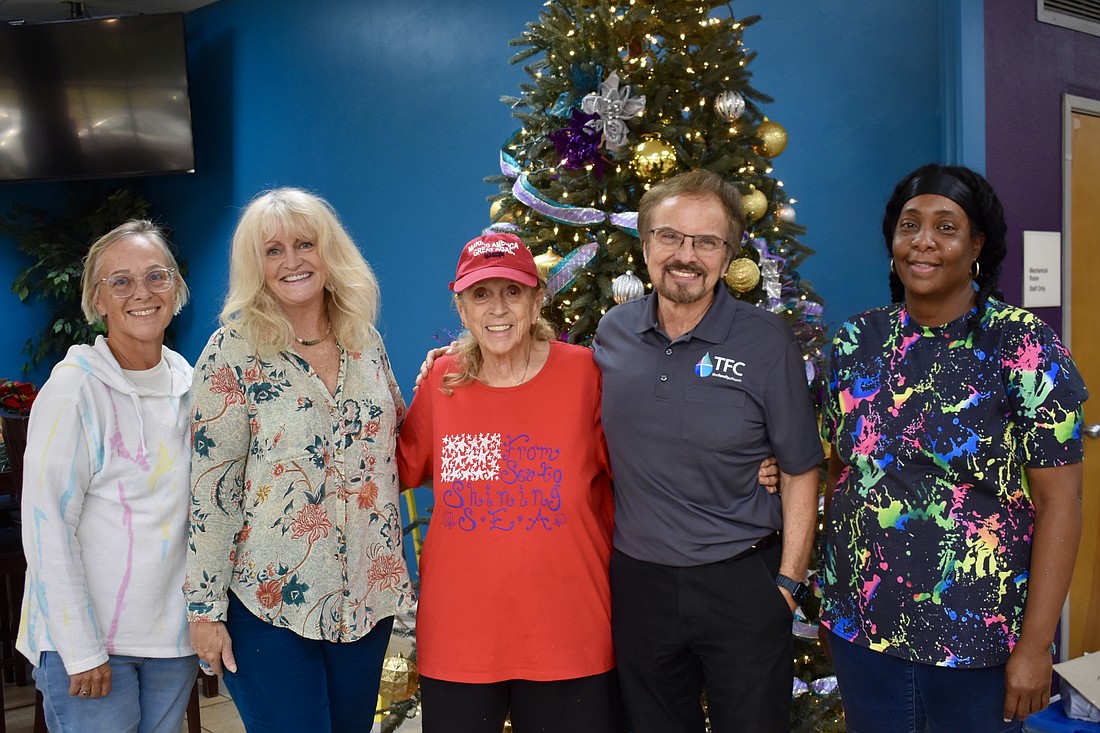 The Family Church caroling crew from left to right is Melody Johnson, Laurie Houston, Nancy Pilato, Pastor Phil Derstine and Terrial Robinson.