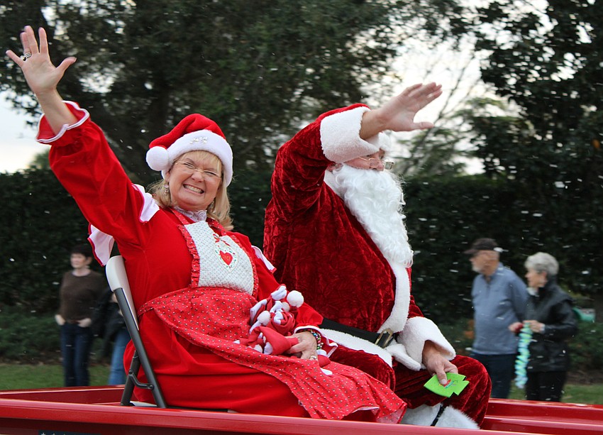 Julie and Andy Lindenmeyer dressed as Mrs. and Mr. Clause and were driven in a Radio Flyer.