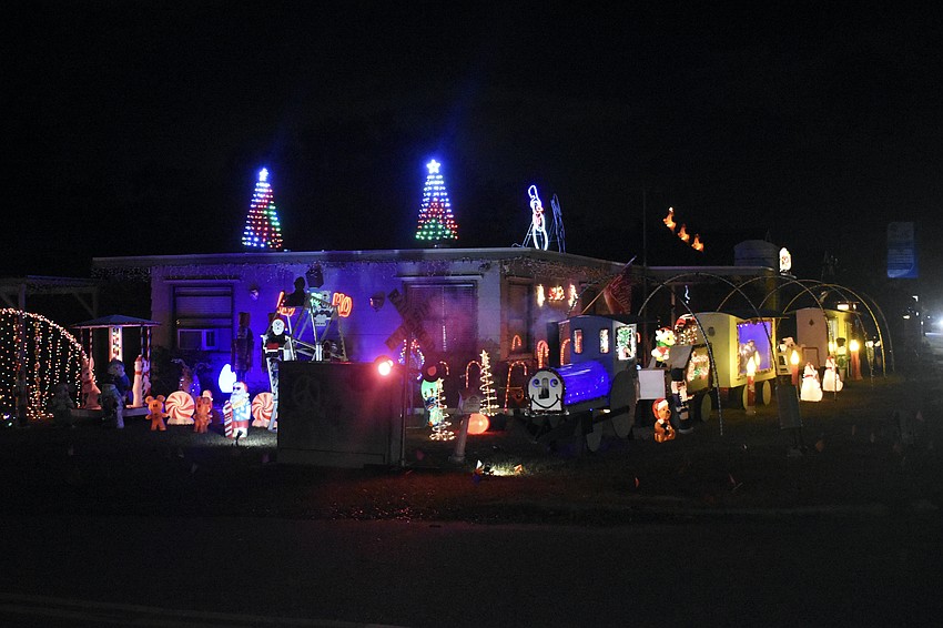 The home at 4020 Swift Road was elaborately decorated with features including a train with moving pistons.