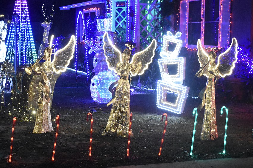 Angels decorate the yard at 4040 Swift Road.