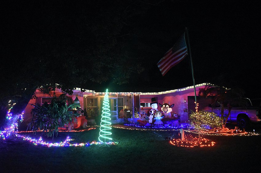 Lights and inflatables adorn the yard at 4623 Busti Drive.