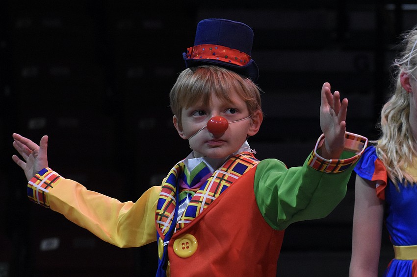 Cayden Banda, 7, rehearses the Clown Act.