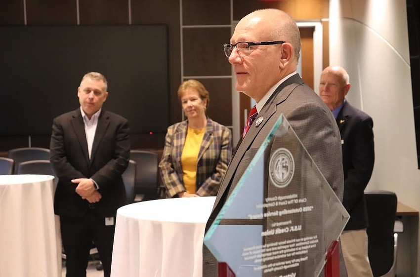 Hillsborough County’s Clerk of the Circuit Court and Comptroller Victor Crist USF Federal Credit Union 2025 Outstanding Service Award for its work using AI and humans to examine banking records.