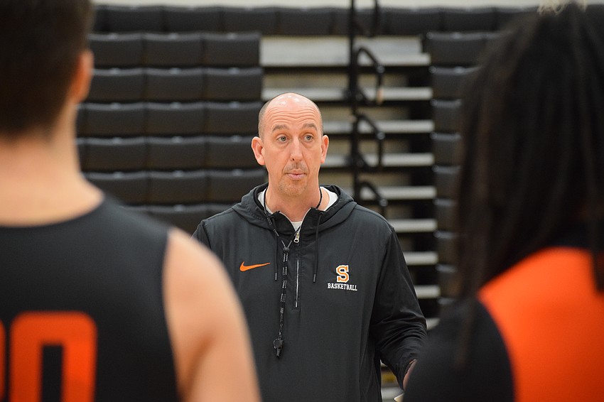 During a practice, Sarasota boys basketball coach BJ Ivey speaks with his players. The Sailors will compete in the Kingdom of the Sun holiday tournament in Ocala following an appearance in the highly-regarded City of Palms Classic.