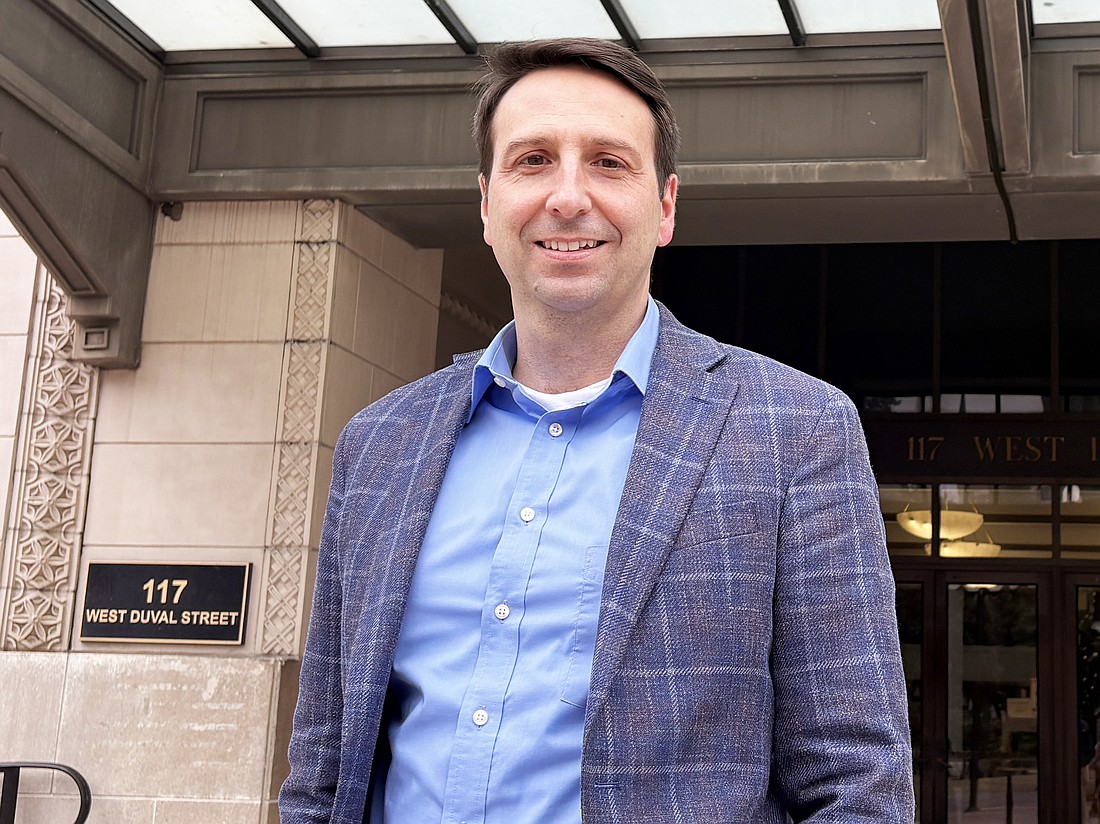 Jacksonville Downtown Investment CEO Colin Tarbert stands outside City Hall at 117 W. Duval St. The longtime Baltimore development executive was hired in August to lead the city’s efforts to revitalize Downtown.