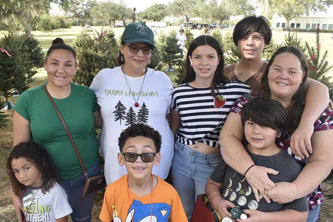 A group from Wilkinson Elementary gathers that includes Quinn Doan, 8, Elise Aponte, Jody Osceola, Jayden Doan, 4, Maya Perez, 12, Nikolas Perez, 8, Lucas Perez, 14, and Jennifer Perez.