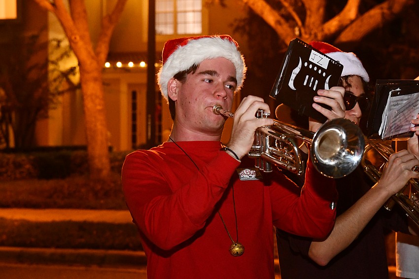 Jay Zimmerman looks forward to bringing his friends and bandmates together every holiday season to carol through his neighborhood.