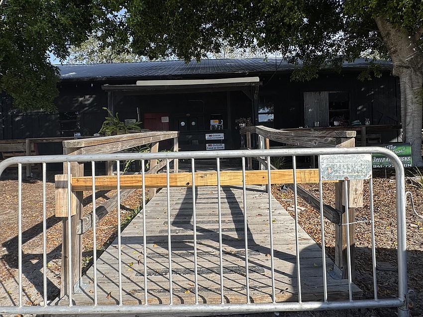 A fence blocks the entrance to The Parrot Live, formerly Big Top Live, after it shuttered.