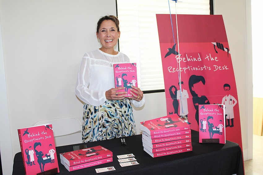 Sarasota-based author Beth Rice contributed to the opening day activities at the Goodwill on Longboat Key with a giveaway of her book, 