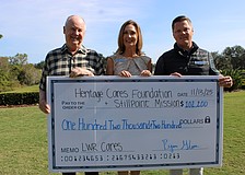 Country Club member Bob Smith, Lifestyle Director Tonya Jansson, and General Manager Ryan Glenn show a check for $102,200 raised through Heritage Cares' Lakewood Ranch Cares — Five Days of Giving initiative.