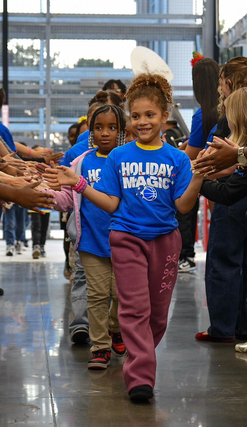 West Orange children paraded through volunteers at the event. West Orange children paraded through volunteers at the event.