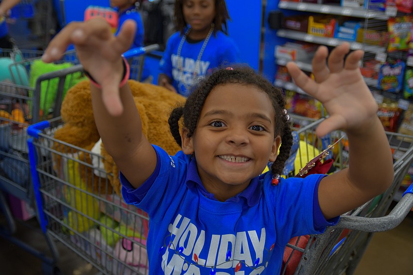 Children’s smiles radiated throughout Walmart. Children’s smiles radiated throughout Walmart.