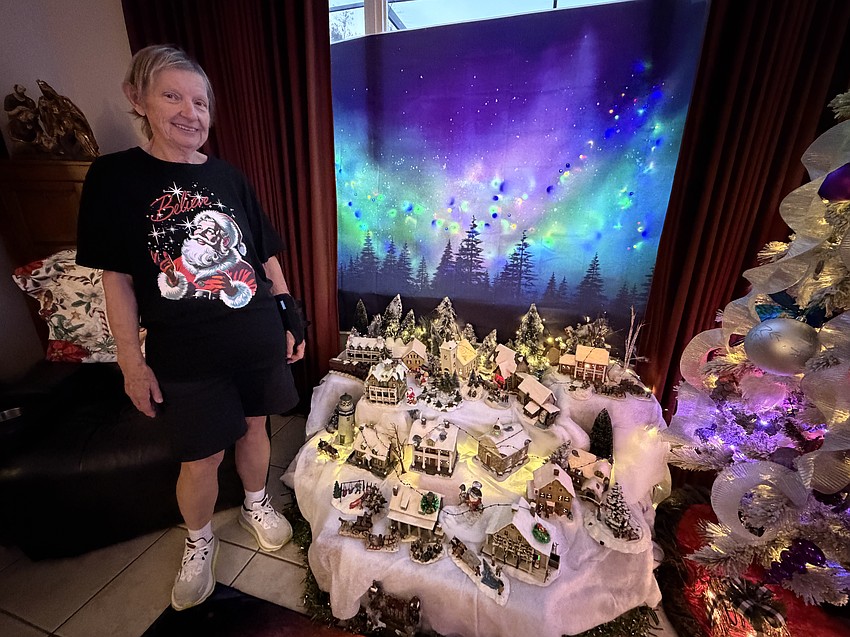 Marge Johnstone has three villages set up around her home.