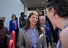 Commissioner Amanda Ballard attends the Under One Roof ribbon cutting ceremony Oct. 1. She's up for reelection in District 2.