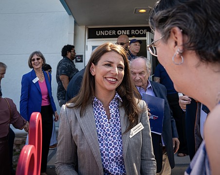 Commissioner Amanda Ballard attends the Under One Roof ribbon cutting ceremony Oct. 1. She's up for reelection in District 2.