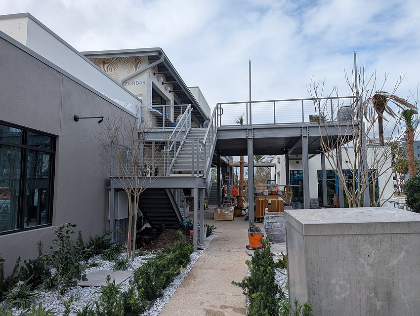 The HUB Brooklyn features a courtyard arrea with stairs leading to the rooftop Zorba's Bar. The HUB Brooklyn features a courtyard arrea with stairs leading to the rooftop Zorba's Bar.