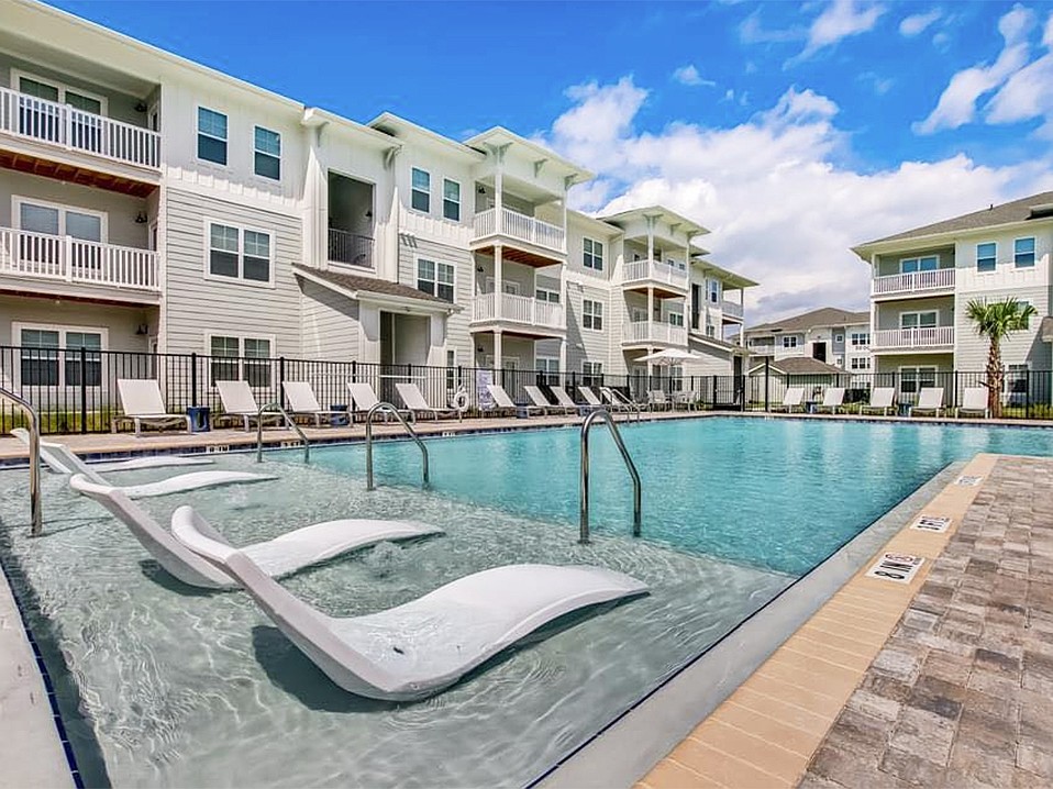 The Exchange at Orange Park apartments is in Jacksonville at 4925 Collins Road north of Orange Park near Interstate 295 and U.S. 17.