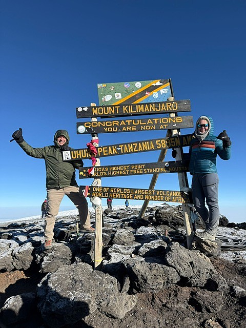 Dan and Jen Vigne at the top of Mount Kilimanjaro.