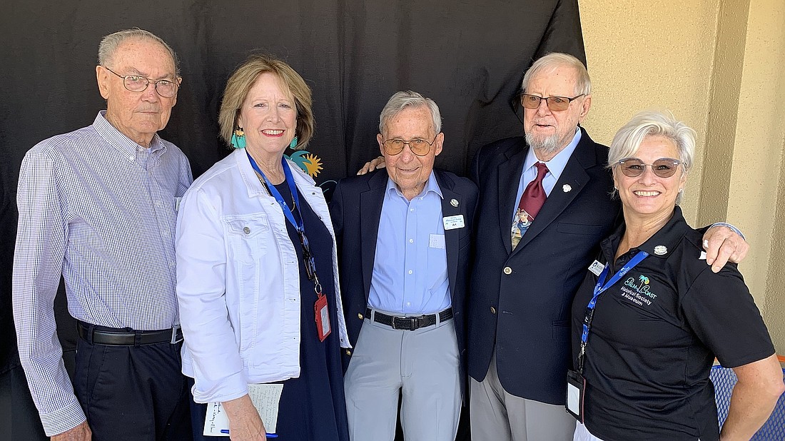 James Canfield, second from right, was honored in 2021 at Palm Coast Founders Day. Here, pictured with Bill Venne, Elaine Studnicki, Art Dycke and Kathy Reichard-Ellavsky. File photo by Brian McMillan