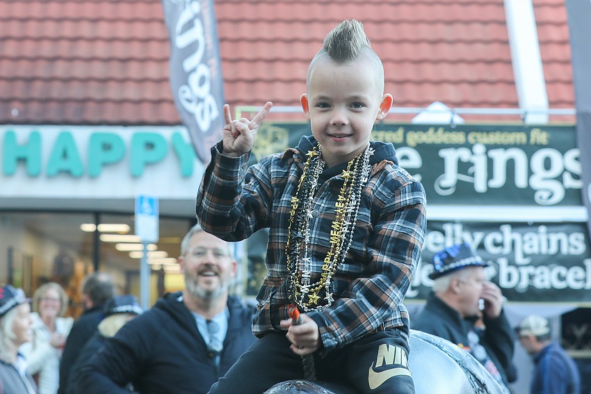 Sawyer O'Dell takes a turn on the mechanical bull and holds today's family record for 44 seconds.