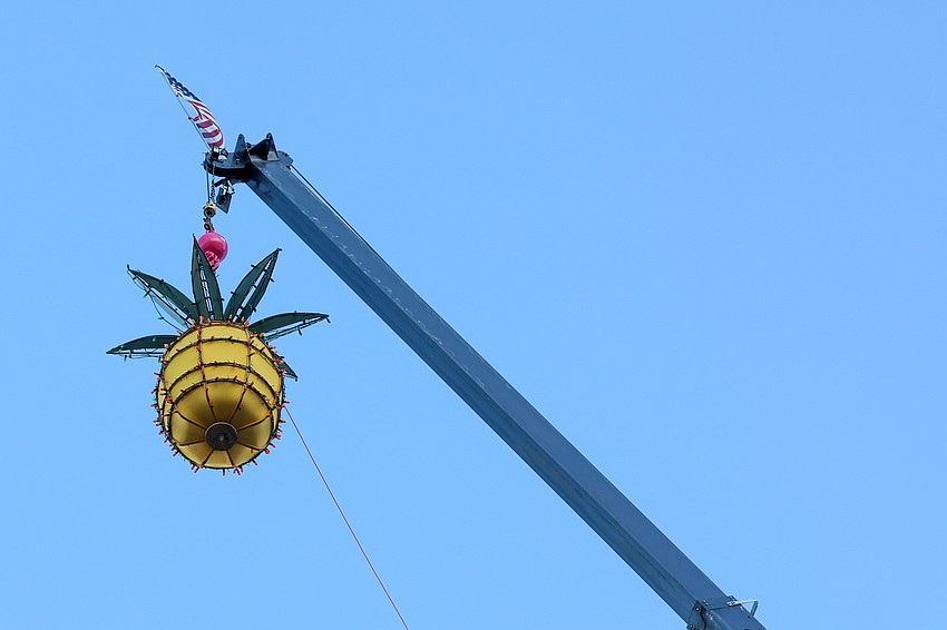 Sarasota drops a lighted pineapple each year to promote welcoming coastal, tropical vibes and to symbolize hospitality.