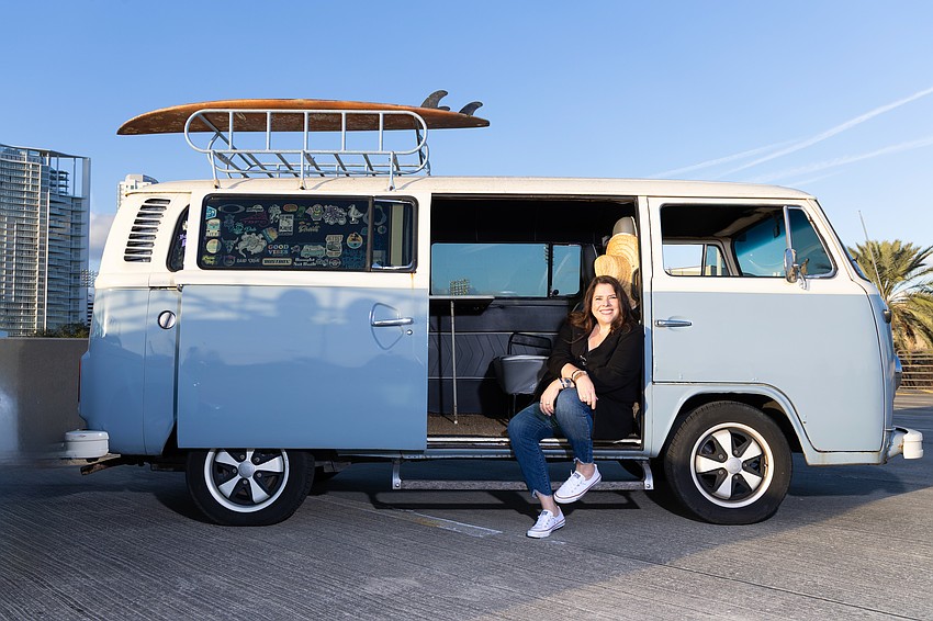 Ginger Galloway, founder of Pinstripe Marketing & Interactive, poses in her 1977 Volkswagen bus named Piper. Ginger Galloway, founder of Pinstripe Marketing & Interactive, poses in her 1977 Volkswagen bus named Piper.