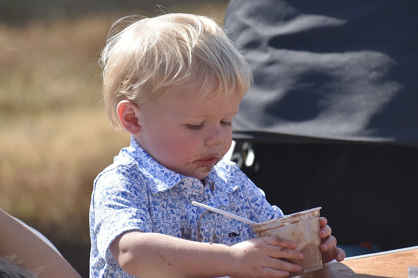 Rein Ross, 1, enjoys ice cream.