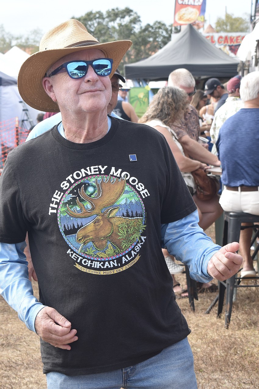 Jeff Hoffman dances to the music.