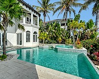 Views from 1418 John Ringling Parkway include the city skyline, Sarasota Bay and John Ringling Bridge.