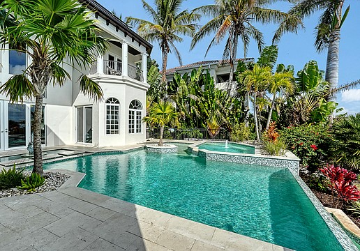 Views from 1418 John Ringling Parkway include the city skyline, Sarasota Bay and John Ringling Bridge.