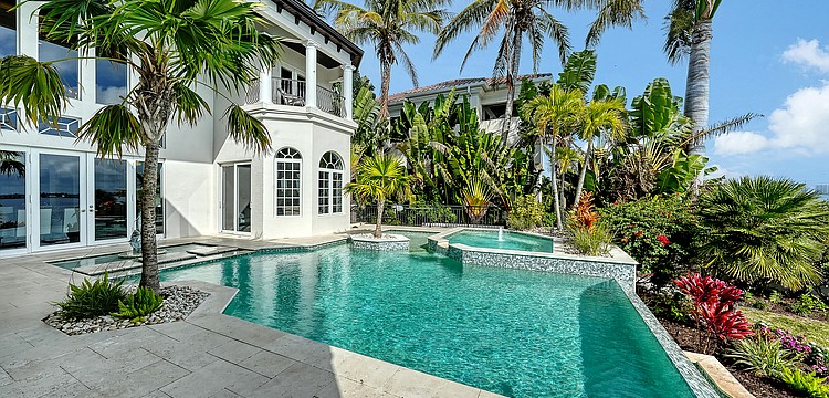 Views from 1418 John Ringling Parkway include the city skyline, Sarasota Bay and John Ringling Bridge.