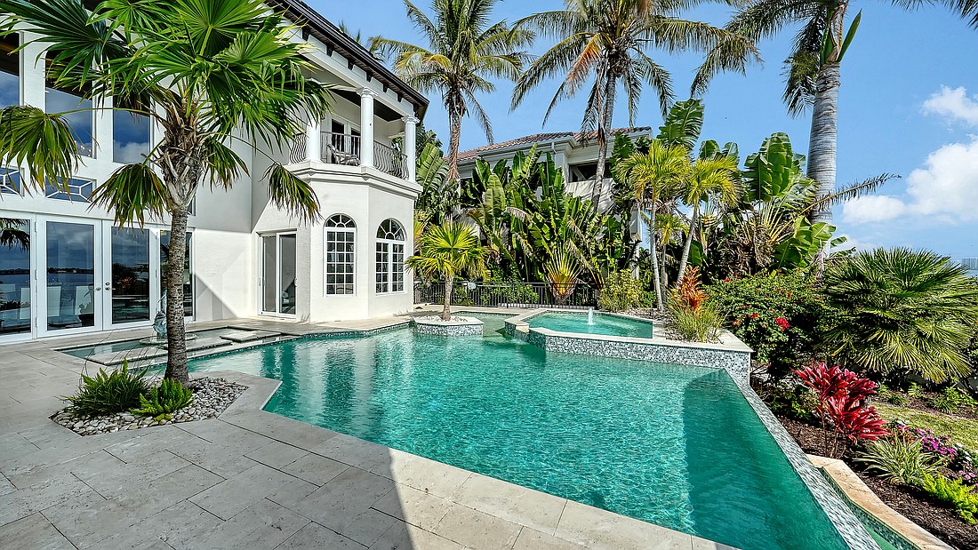 Views from 1418 John Ringling Parkway include the city skyline, Sarasota Bay and John Ringling Bridge.