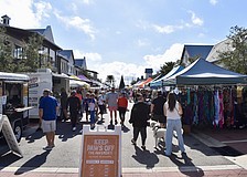 The first farmers market of 2026 at Waterside Place draws a large crowd.