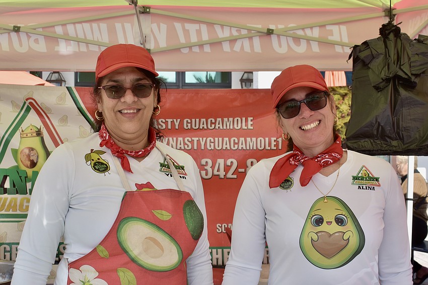Yilian Martos and Alina Ronquillo know how to dress to sell guacamole. Dynasty Guacamole sells at every farmers' market in Southwest Florida.