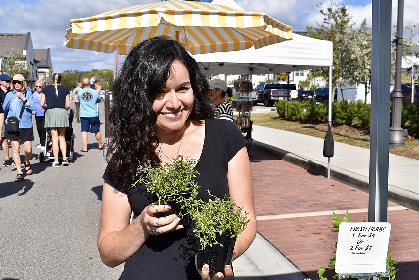 Maria Des Vignes runs the Succulantes stand, which sells succulents and herbs.