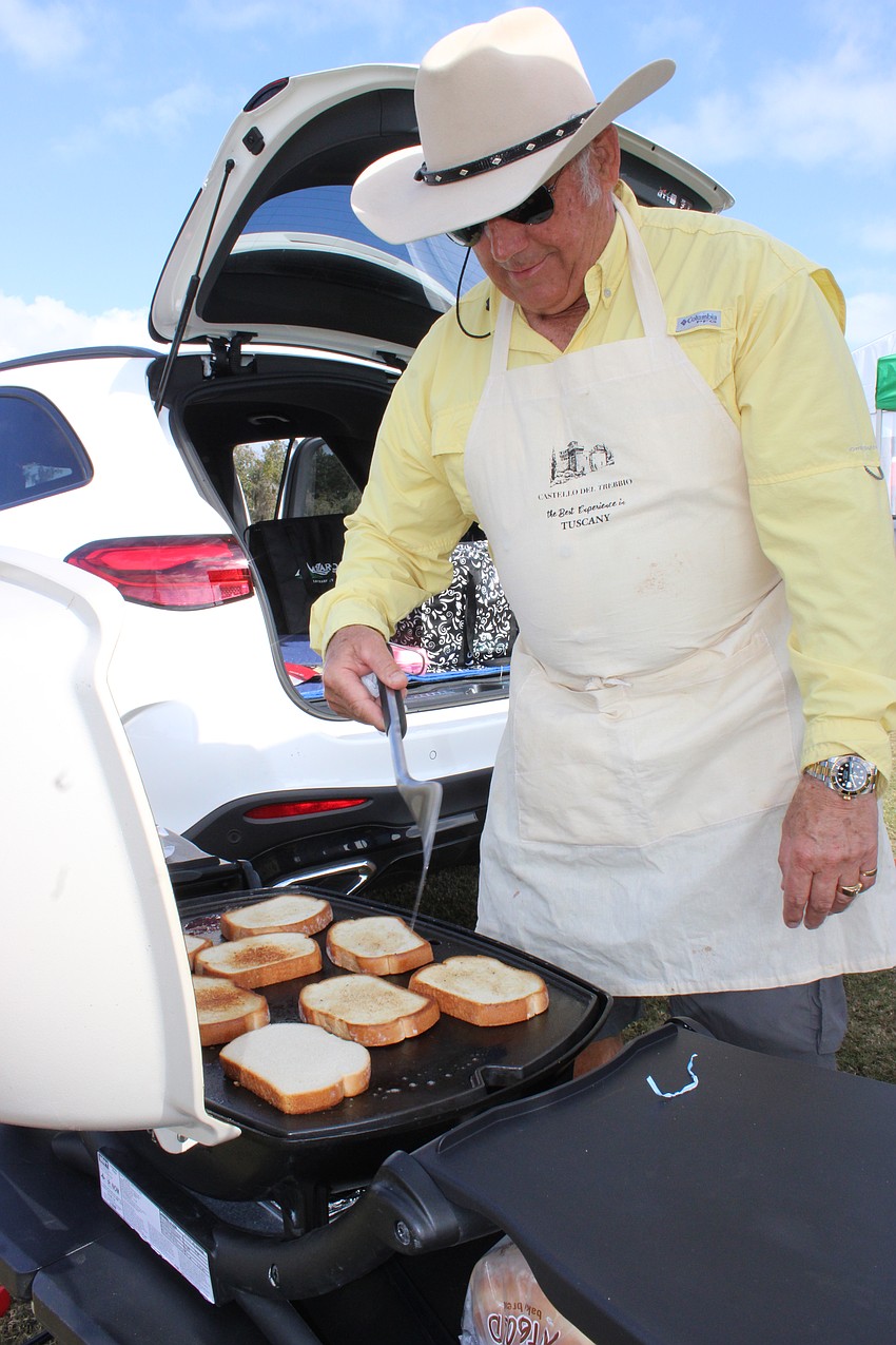 Lakewood Ranch's Don Lippert flips the toasted bread for fried egg sandwiches for his tailgating group. Lippert says he goes to polo every Sunday.