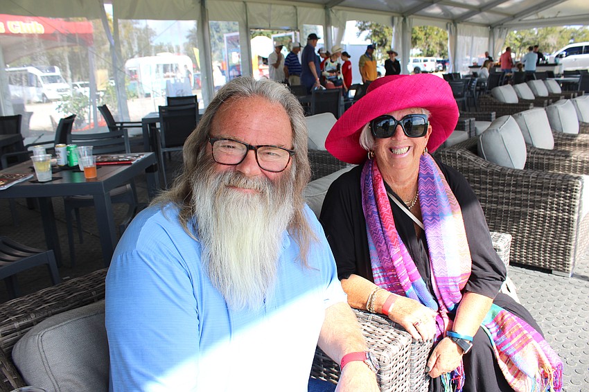 The Meadows' Damien and Debra Ruppert enjoy their Mallet Club seats at midfield at the Sarasota Polo Club. They love the shade the tented pavilion provides.