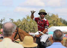 Southside Polo's Mason Wroe talks to fans about the basics of his sport in a short clinic before the Jan. 4 match.
