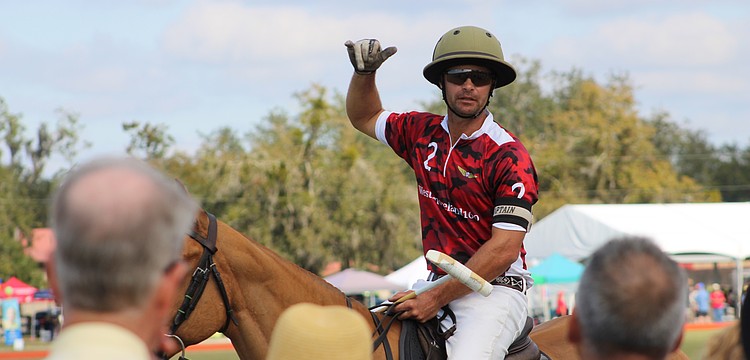 Southside Polo's Mason Wroe talks to fans about the basics of his sport in a short clinic before the Jan. 4 match.