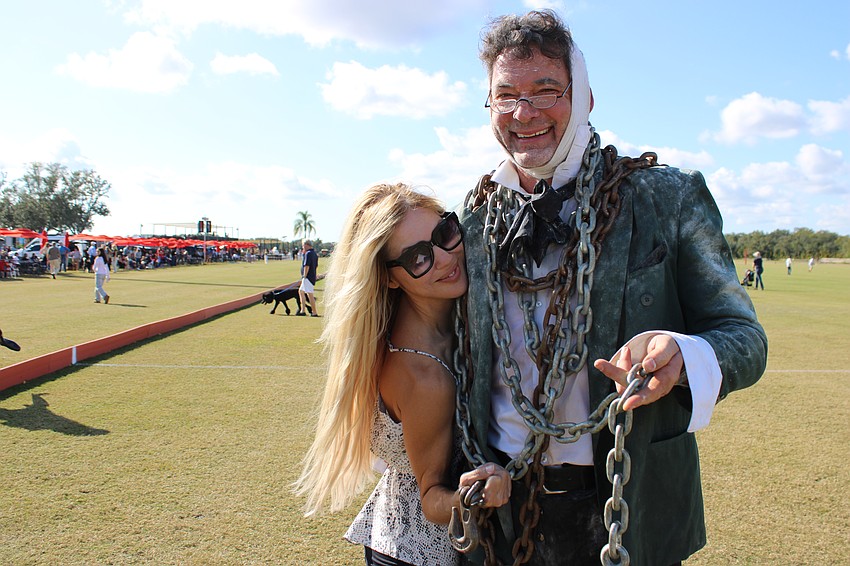 Karen Medford isn't scared that Scott Ginn looks ghastly at the Sarasota Polo Club. The theme Jan. 4 was Favorite Literary Character and Ginn chose Jacob Marley of 