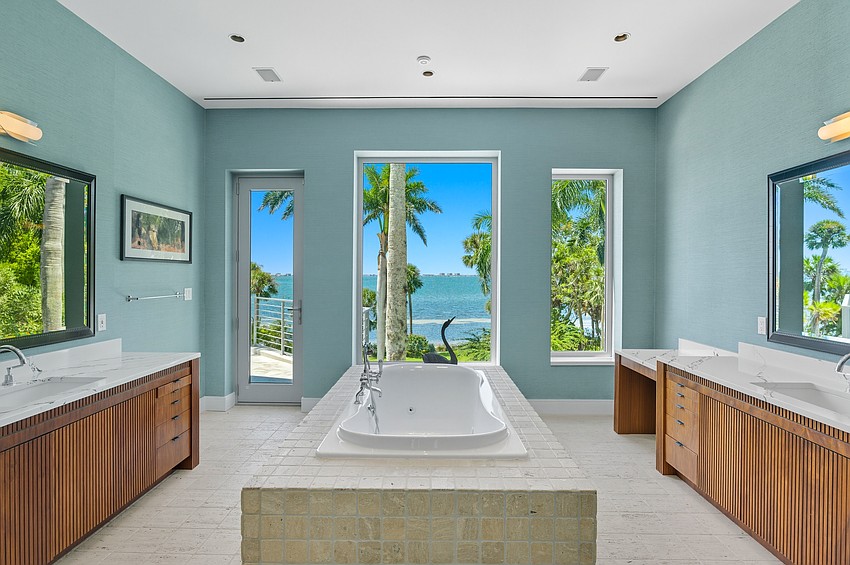 Most of the 16 rooms inside the house feature views of Sarasota Bay, according to the listing.
