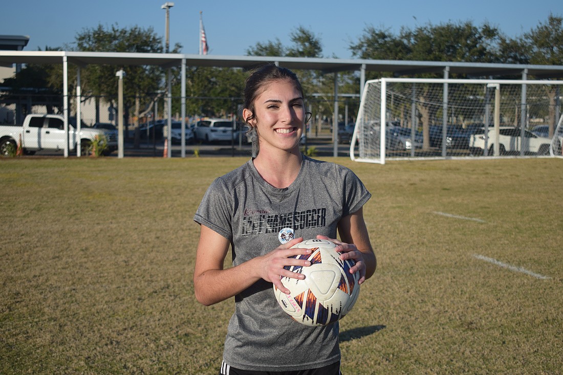 Bronwyn Leggett poses for a photo before a Jan. 5 practice at Riverview High School. She's deep into her second season as the full-time starter between the posts for the Rams.